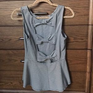 Peplum tank with Open Back.